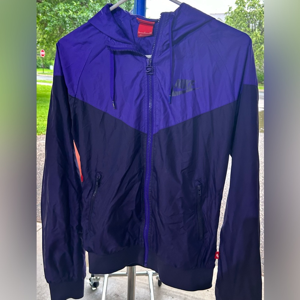 Two toned purple Nike windbreaker.